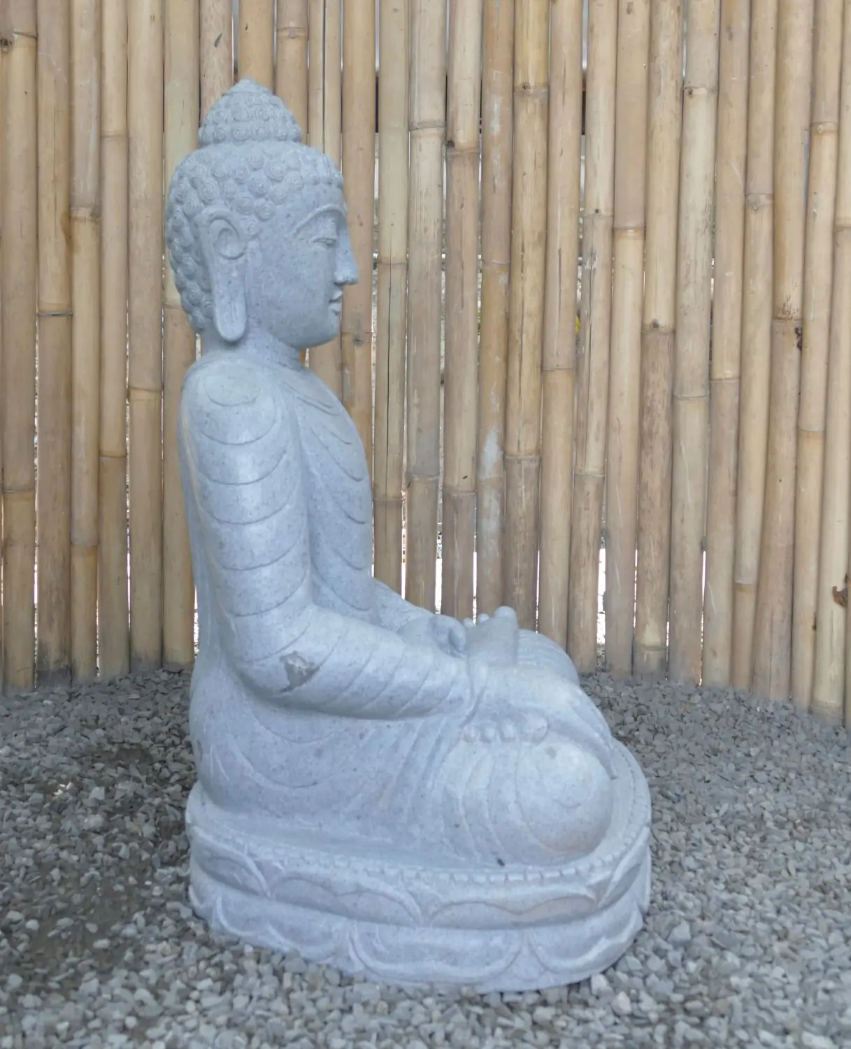  Product image 6 of the product “Seated Buddha made of Riverstone in Bhumisparsha - gesture of touching the earth. 82cm height. ”